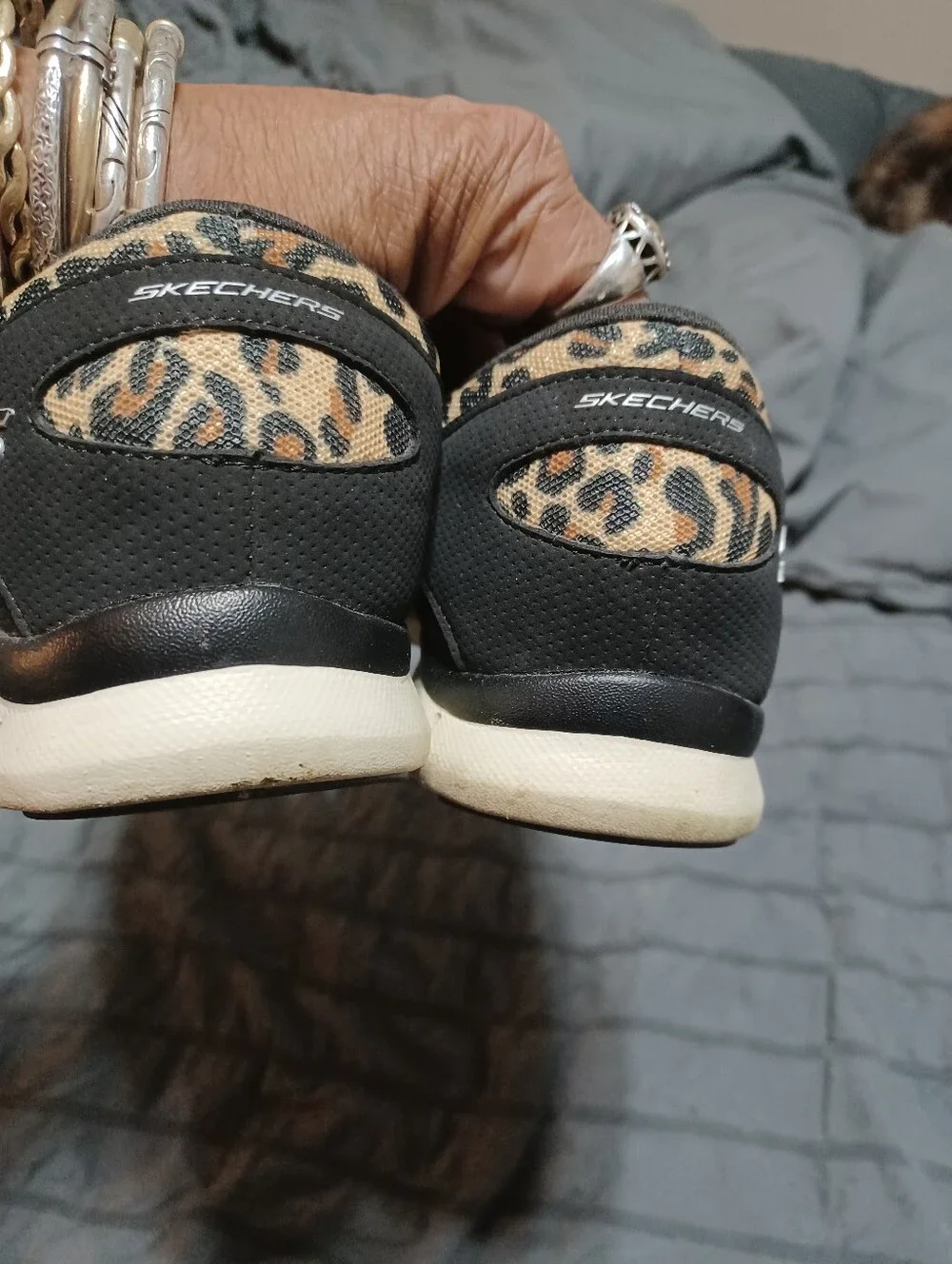 Skechers Leopard-Print Slip-On Sneakers in Black and Tan